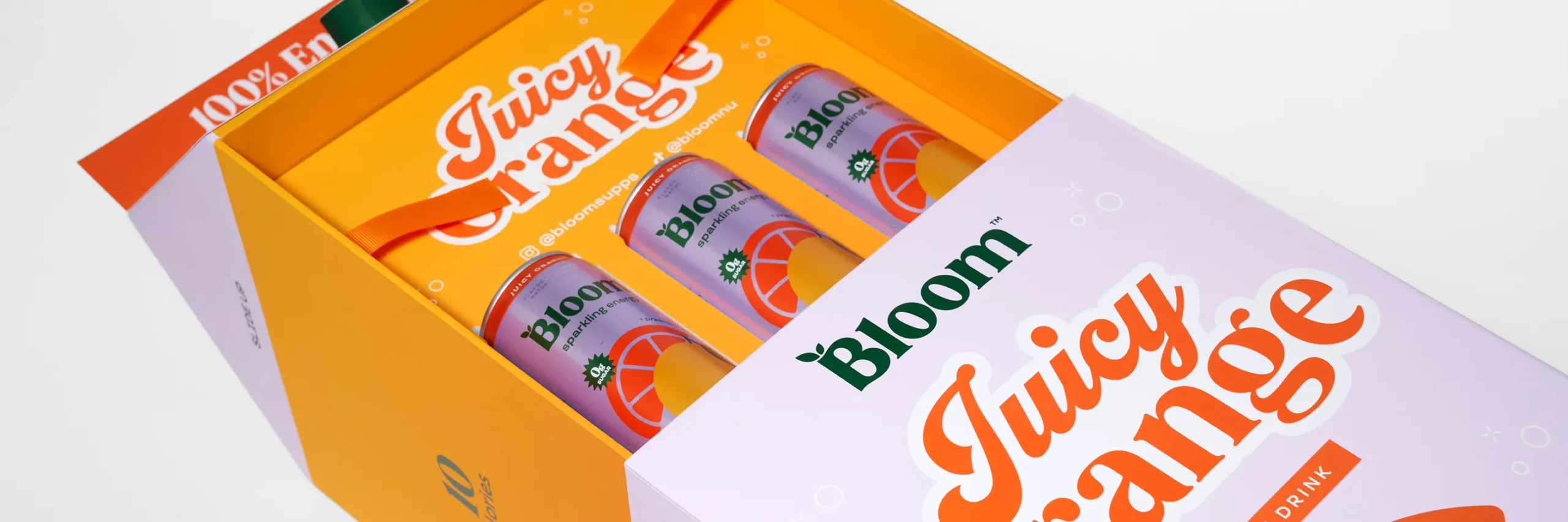 an image showing packaging for bloom's juicy orange energy drink