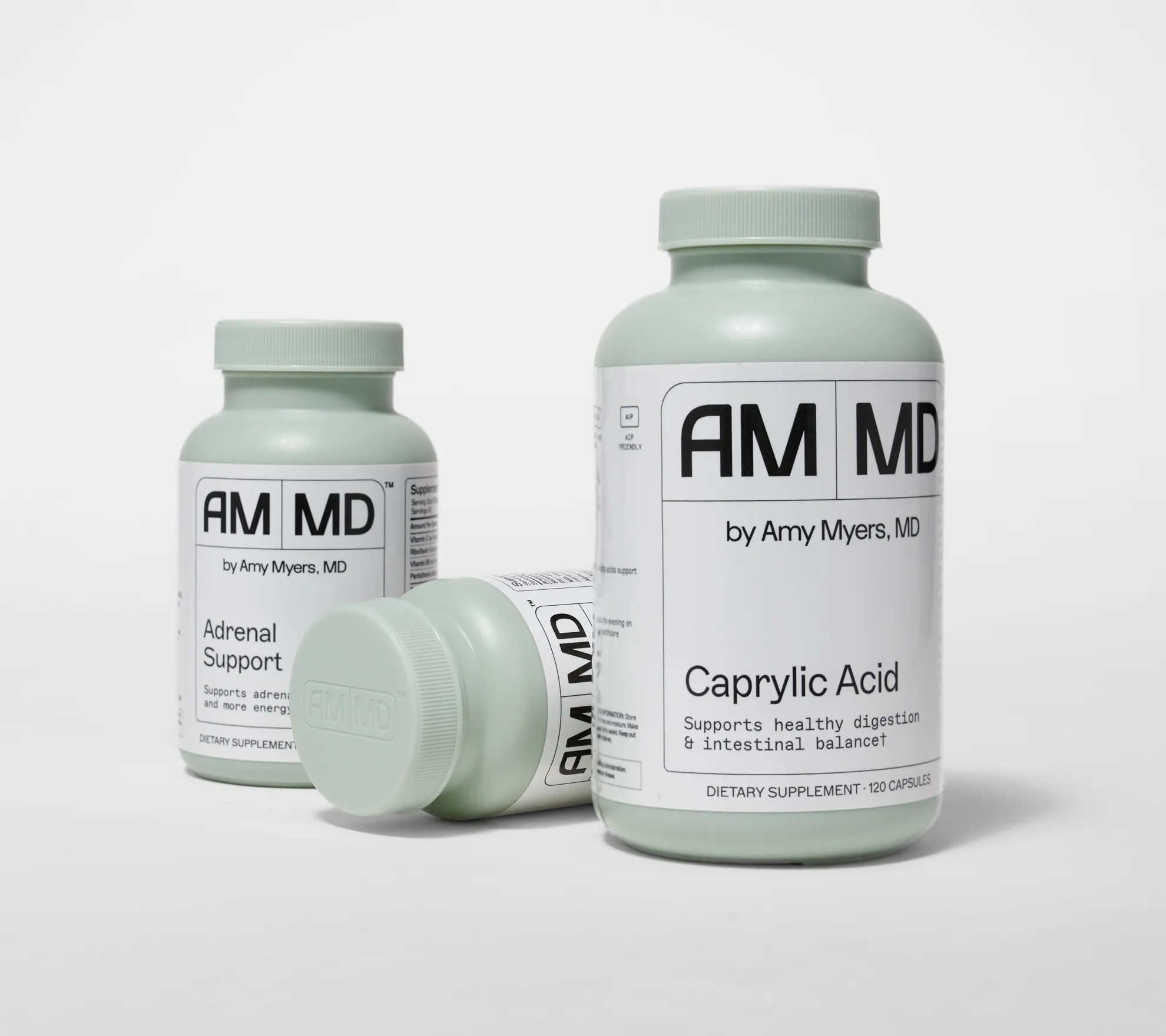 an image of health and wellness supplement packaging, including adrenal support and caprylic acid