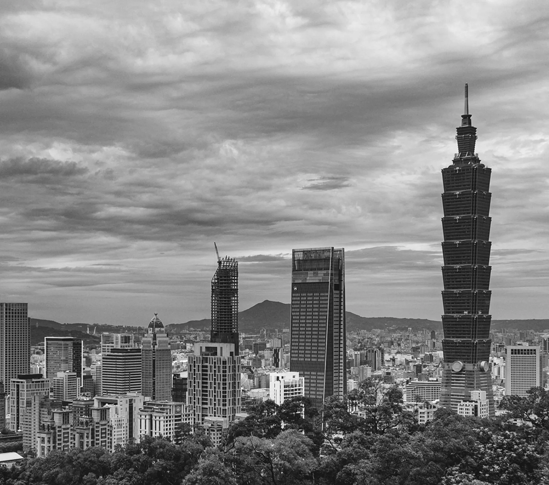 a black and white image of a black and white city skyline in Teipei