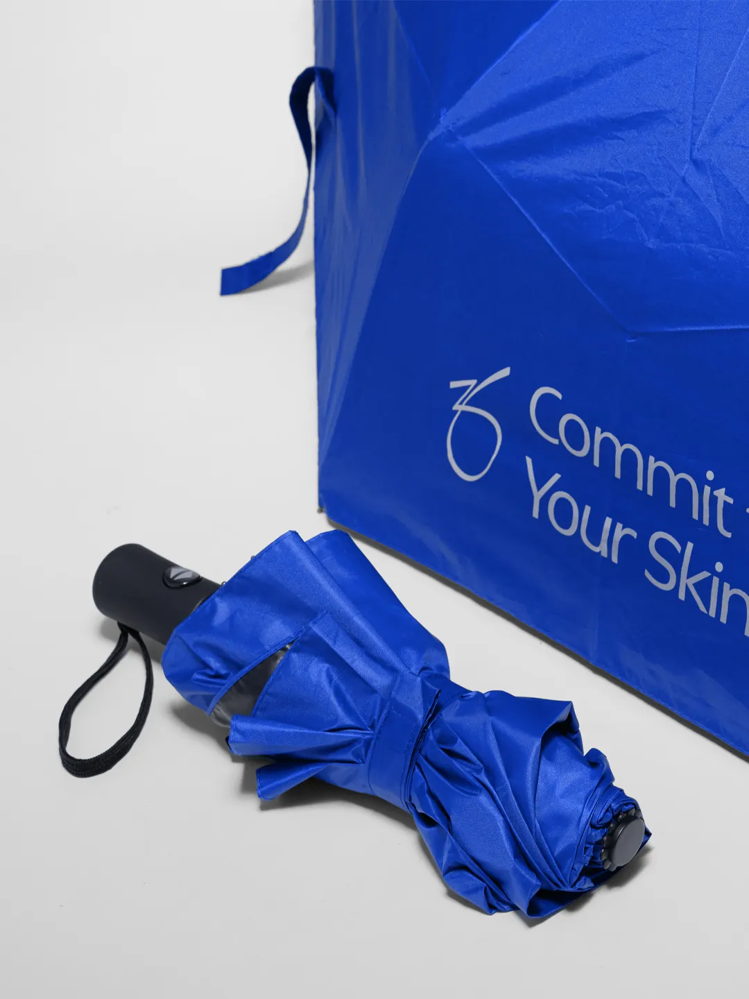 an image showing a blue umbrella