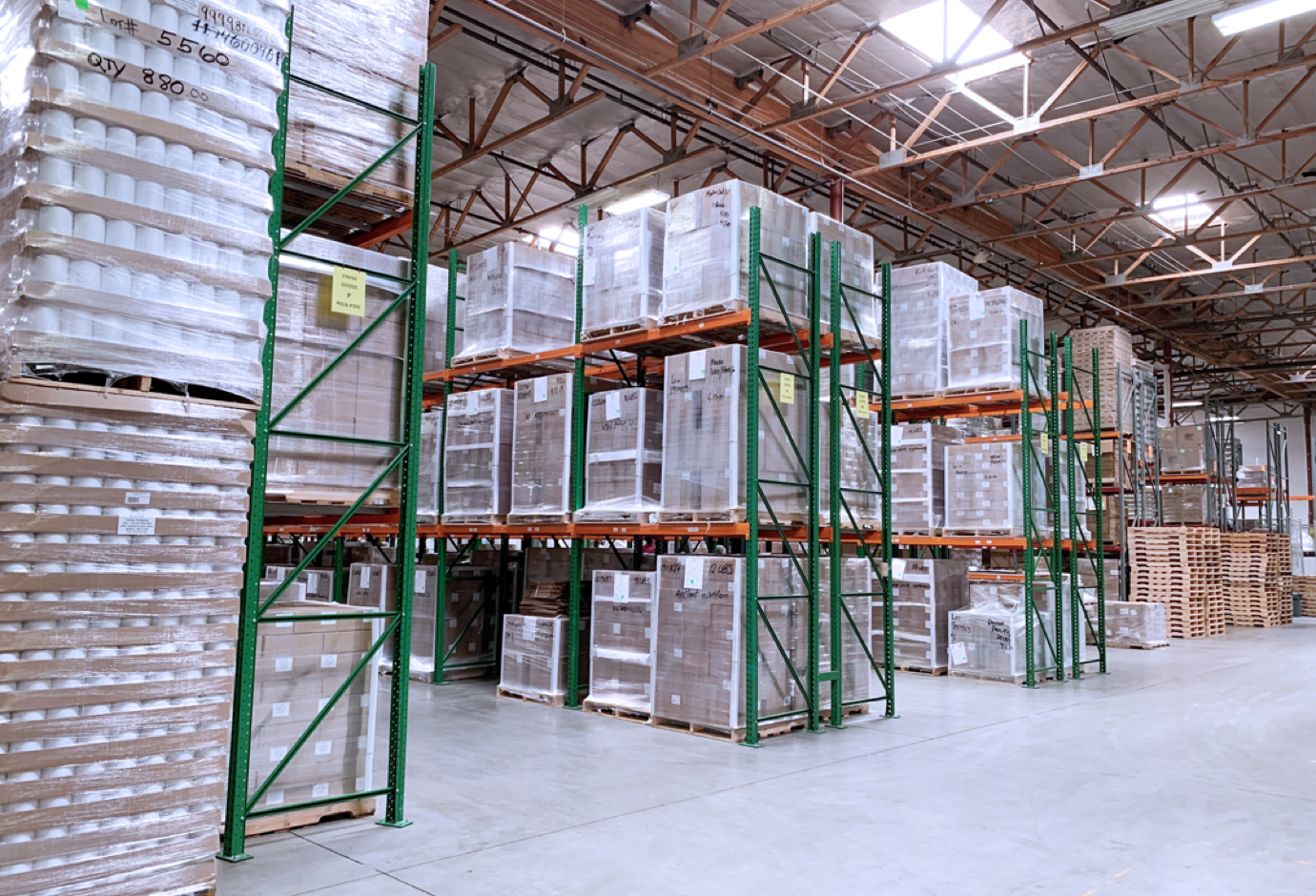 an image of a warehouse with shelves filled with various products