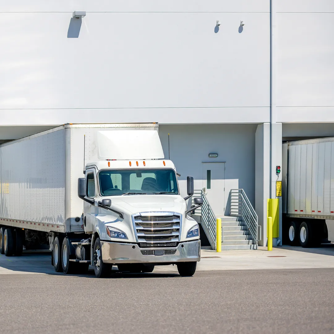 an image of a truck parked in a docking area